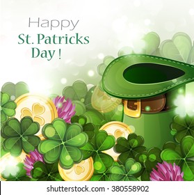 Leprechaun hat and gold coins on clover background.  St. Patrick's Day background.