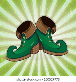 Leprechaun shoes on a striped background. St. Patrick's Day symbol