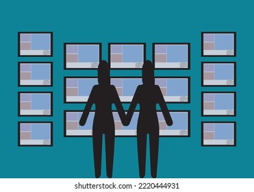 
Lesbian couple looking for a flat to buy or rent. Silhouette of lesbian couple looking at flat ads