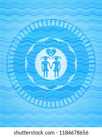 lesbian love icon inside light blue water emblem.