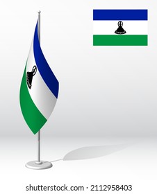 LESOTHO Fahne auf Flagpol für die Registrierung der feierlichen Veranstaltung, Treffen mit ausländischen Gästen. Nationaler Unabhängigkeitstag von LESOTHO. Realistische 3D-Vektorgrafik auf Weiß