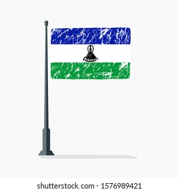 Lesotho flag with scratches on flagpole with shadow in vector