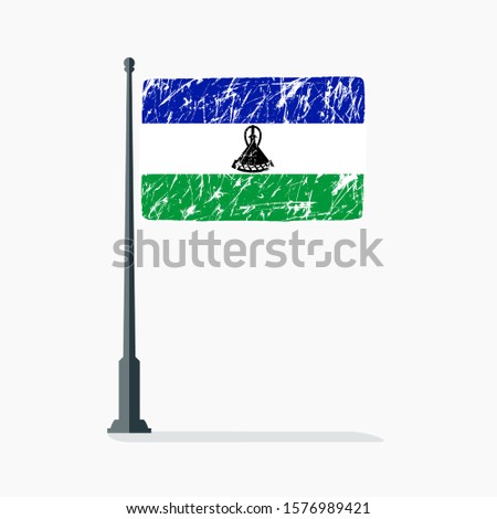 Lesotho flag with scratches on flagpole with shadow in vector