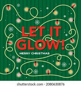 Let it glow hand drawn lettering quote for Christmas time. White letters on a dark green background