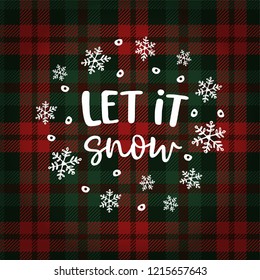 Let it snow Christmas greeting card, invitation with circle of falling snowflakes. Hand lettered white text over tartan checkered plaid. Winter vector calligraphy illustration background.