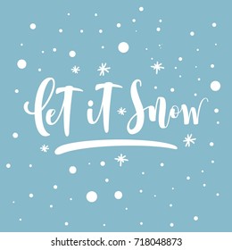 Let it snow. Inspirational winter quote, brush lettering at blue background.