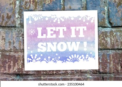 Let it snow. Vector Typographical Watercolor Poster on a Brick Wall