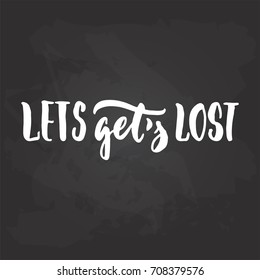 Lets gets lost - travel and adventure hand drawn lettering quote in white color on the black chalkboard background. Fun ink calligraphy inscription