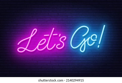 Let's go neon quote on a brick wall.