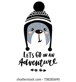 Let's go on an adventure hand lettering. Cute cartoon bear boy in winter hat. Childish print for nursery, kids apparel,poster, postcard. Vector Illustration