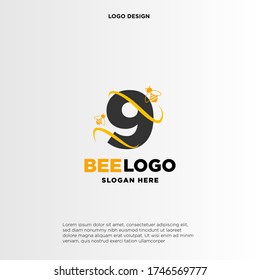 letter 9 logo and honey bee
