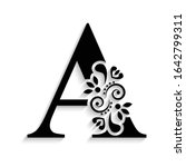 letter A. Black flower alphabet.  Beautiful capital letter with shadow