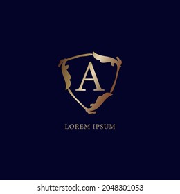 Letter A Alphabet logo design template. Decorative floral shield sign illustration isolated on navy blue background. Luxury metallic gold security logo concept.