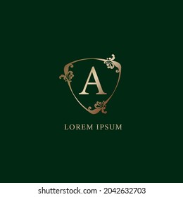 Letter A Alphabetic logo design template. Insurance logo concept isolated on dark green background. Luxury gold decorative floral shield sign illustration.