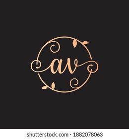 Letter AV Decorative, Classy Monogram logo inside a circular stalk, stem, or root with floral, leaves elements. Letter AV florist logo. AV wedding logo, crafting logo