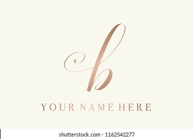 Letter b logo.Elegant small lettering initial b with decorative swirl.Metallic rose gold color icon isolated on light  background.Luxury style.