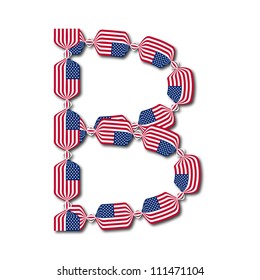 Letter B made of USA flags in form of candies on white background