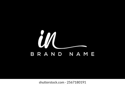 IN letter beauty handwriting vector logo. 