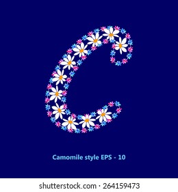 Letter "C" decorated with flowers of chamomile.