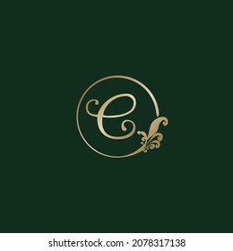 Letter C Decorative Alphabet Logo isolated on green Background. Luxury Gold Ring Initial Logo Design Template. Elegant Curl Floral Logo Concept.