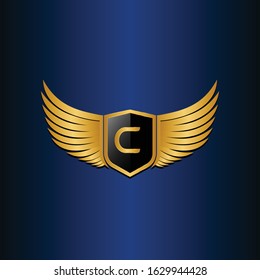 letter C shield with wings gold color logo design concept template vector 3d heraldic shield and wings logo gold / silver emblem