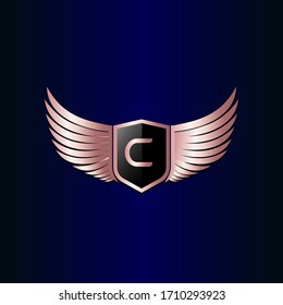 letter C shield with wings gold color logo design concept template vector 3d heraldic shield and wings logo gold / silver emblem