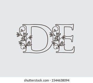 Letter D, E and DE Vintage Floral Logo Icon, overlapping monogram logo, Simple Swirl Black color Logo on white background. Classy Letter Logo Icon.