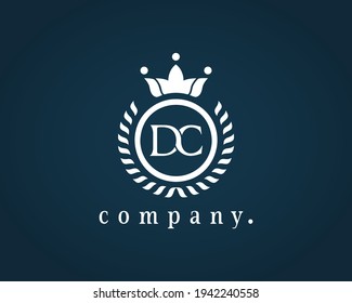 Letter DC, D C laurel wreath logo. Beautiful calligraphy with a crown. The elegant emblem for Royalty, Restaurant, Boutique, Hotel, Heraldic, Jewelry, label, brand name. Vector illustration. EPS 10.