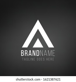 Letter A or delta geometric triangle logo design. Business identity tech element. Stock Vector illustration isolated on black background.