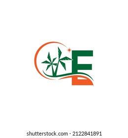Letter E blends with coconut trees by the beach at night template