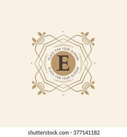 The letter E. Flourishes calligraphic monogram emblem template. Luxury elegant frame ornament line logo design vector illustration. Example designs for Cafe, Hotel, Heraldic, Restaurant, Boutique