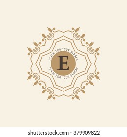 The letter E. Flourishes calligraphic monogram emblem template. Luxury elegant frame ornament line logo design vector illustration. Example designs for Cafe, Hotel, Heraldic, Restaurant, Boutique