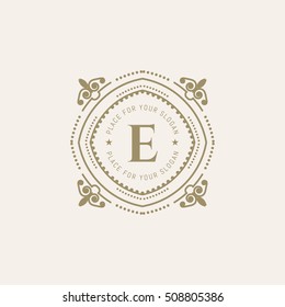 The letter E. Flourishes calligraphic monogram emblem template.