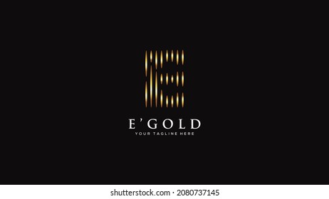 Letter E gold rain drop logo design, luxury design