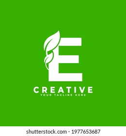 Letter E with Leaf Logo Design Element on Green Background. Usable for Business, Science, Healthcare, Medical and Nature Logos