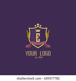 Letter E logo design. Luxury shield crown brand concept. Classic emblem sign.