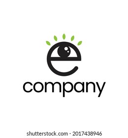 The letter E logo with an eye symbol and green leaf eyelashes