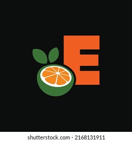 Letter E logo and fresh citrus fruit in modern style. With dark background