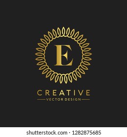 Letter E Logo Initial. Gold Letter Design Vector Golden Luxury Colors