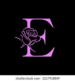Letter E logo with Rose Flower for beauty and fashion logo. Rose flower in pink color for symbol . vector eps10