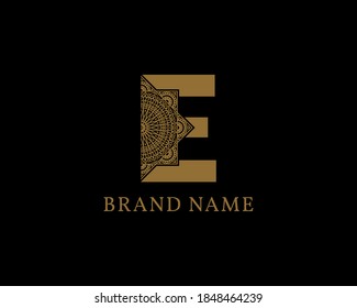 letter E mandala royal vintage decorative logotype for luxurious product of company or brand, beauty care, bridal, wedding organizer or spa