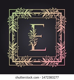 letter E in square frame with leafs