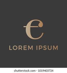 Letter E T C Gold with dark grey background logo