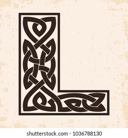 Letter of the English alphabet with Celtic national ornament as interlaced ribbon on a beige background. Paryrus with the aging effect.