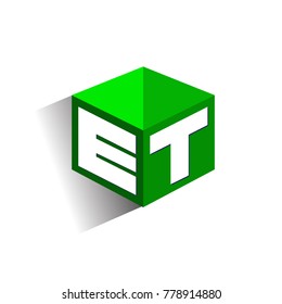 Letter ET logo in hexagon shape and green background, cube logo with letter design for company identity.
