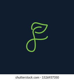 letter F with the concept of a monogram in the form of green leaves