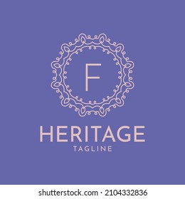 letter F feminine circle frame luxury vector logo design
