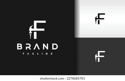 letter F hammer nail logo