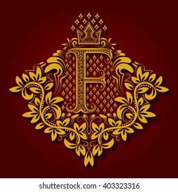 Letter F heraldic monogram in coats of arms form. Vintage golden logo with shadow on maroon background. Letter F is surrounded by floral elements of design.