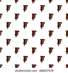 Letter F from latin alphabet with numbers and symbols made of dark melted chocolate
